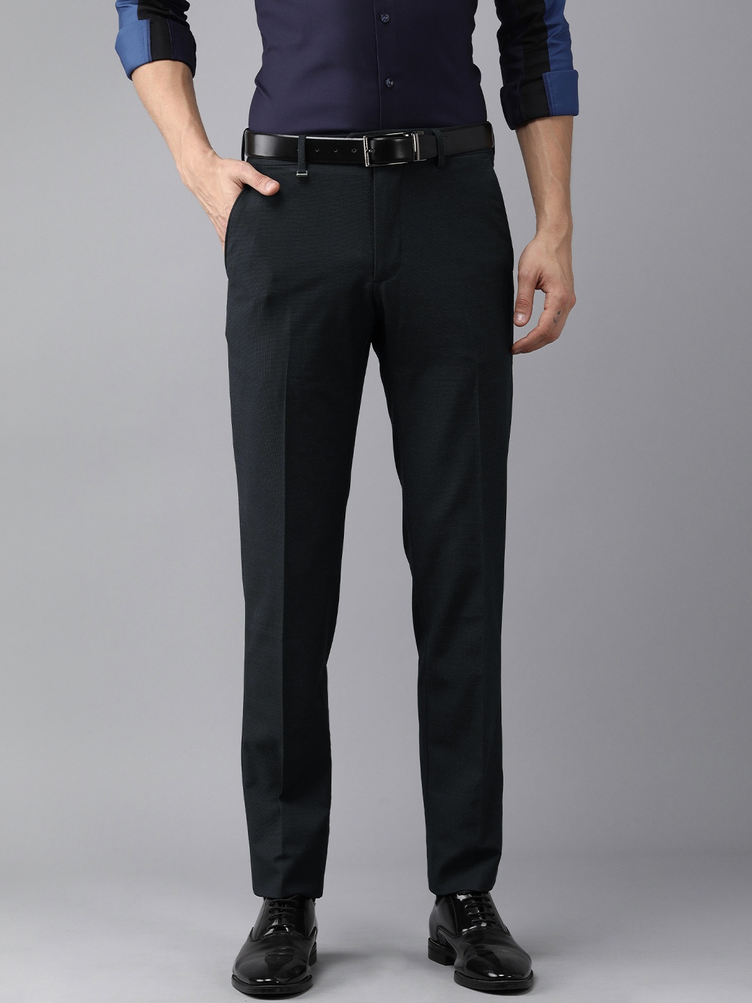 

Van Heusen Men Black Textured Mid Rise Slim Fit Trousers