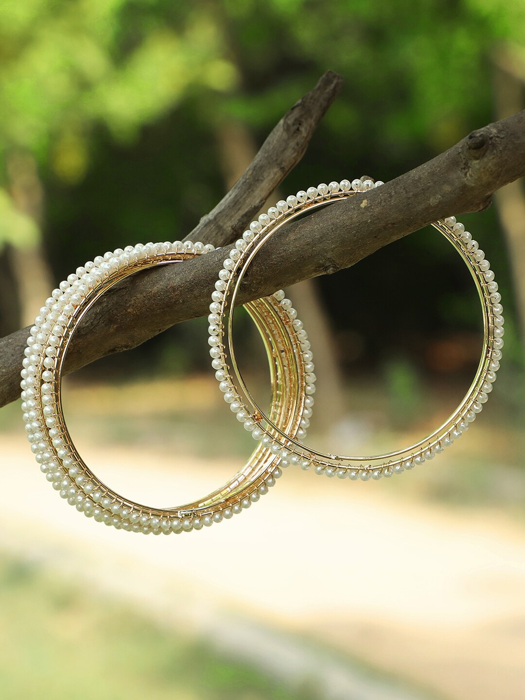 

Adwitiya CollectionSet Of 4 Gold-Plated White Beaded Handcrafted Bangles