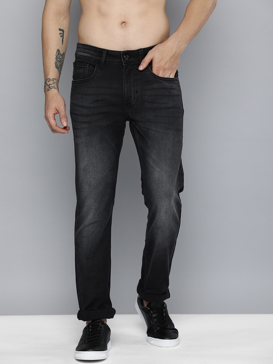 

Flying Machine Men Black Micheal Slim Tapered Fit Light Fade Stretchable Jeans