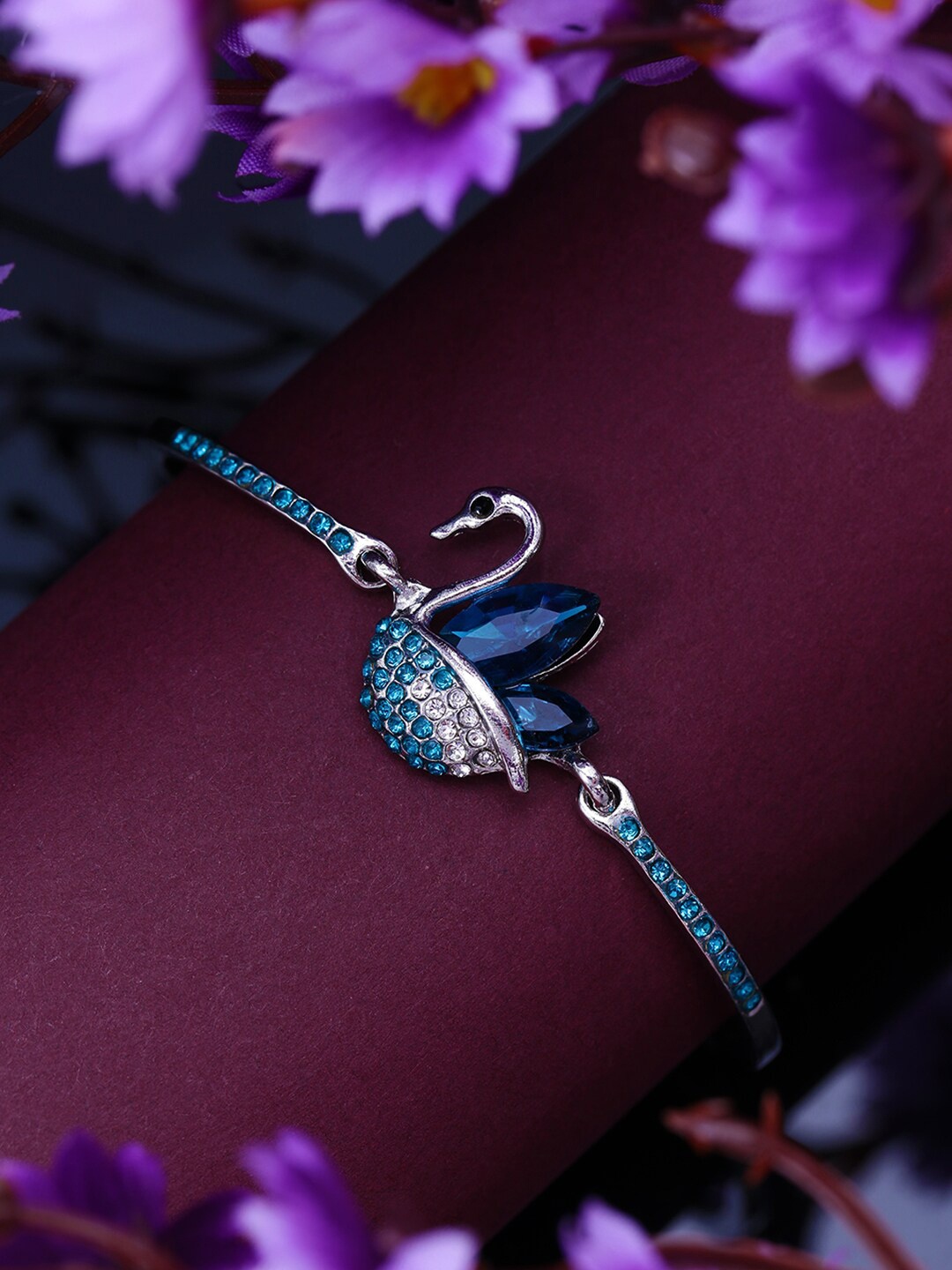 

Yellow Chimes Women Silver-Toned and Blue Crystals Silver-Plated Bangle-Style Bracelet