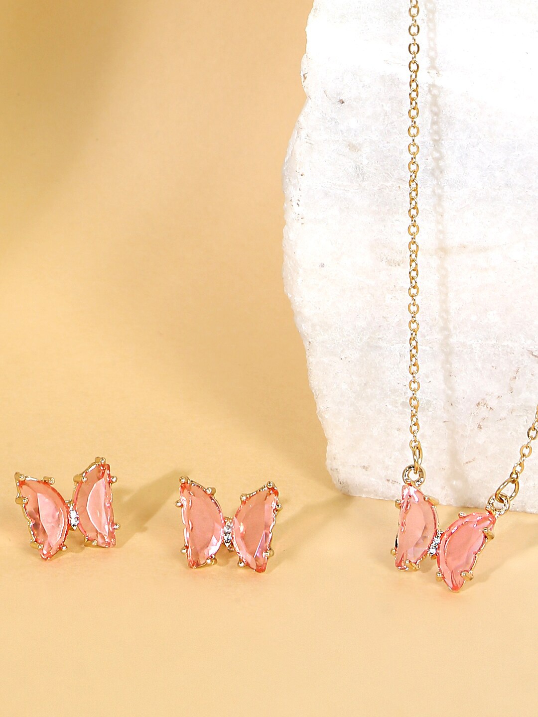 

Yellow Chimes Gold-Plated & Pink Crystal Studded Jewellery Set