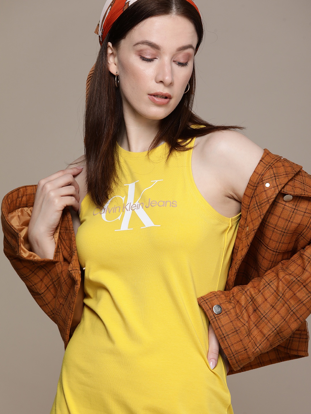 

Calvin Klein Jeans Women Yellow Brand Logo Printed Sheath Dress