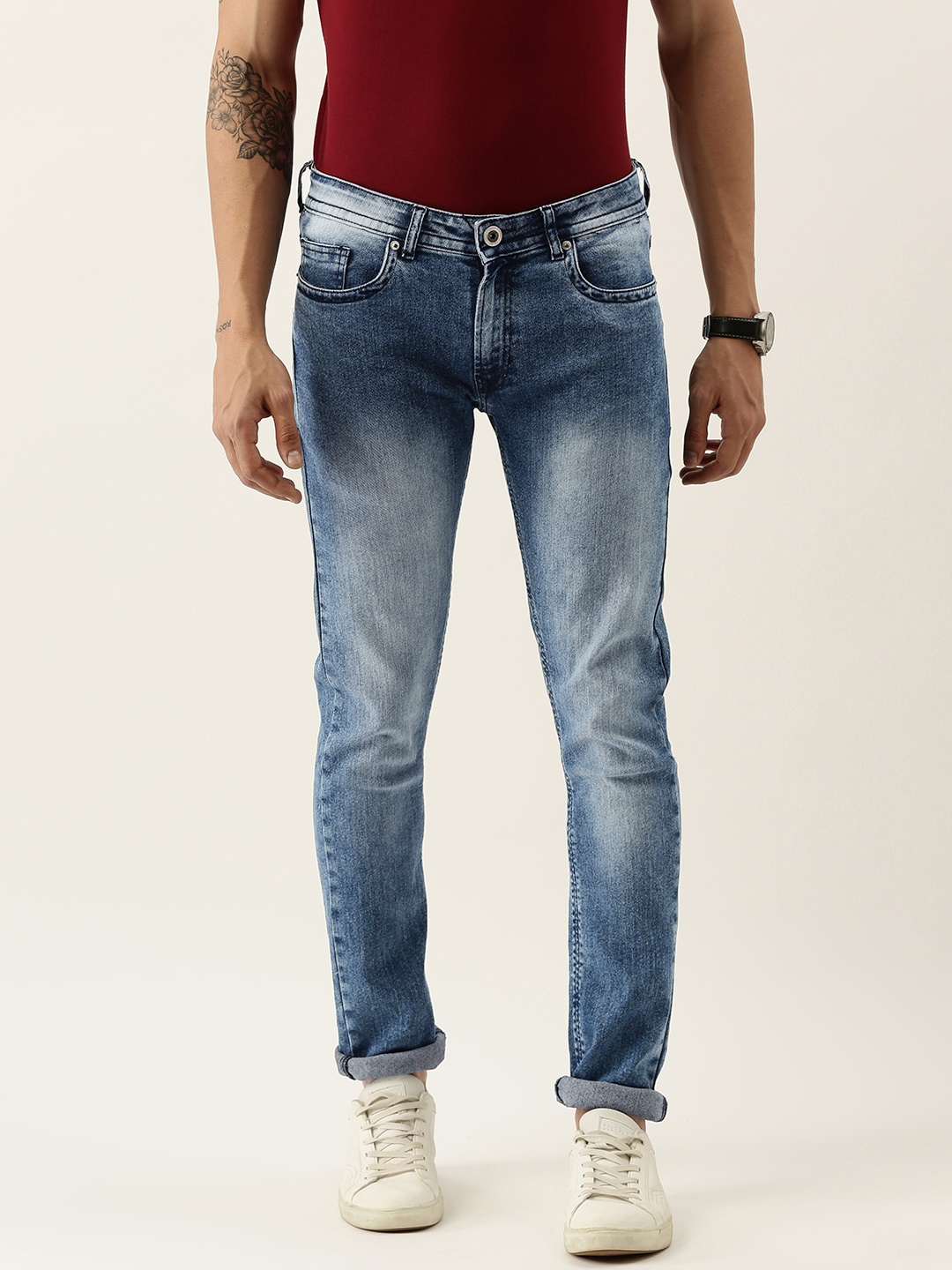 

Peter England Casuals Men Blue Slim Tapered Fit Mid-Rise Heavy Fade Stretchable Jeans