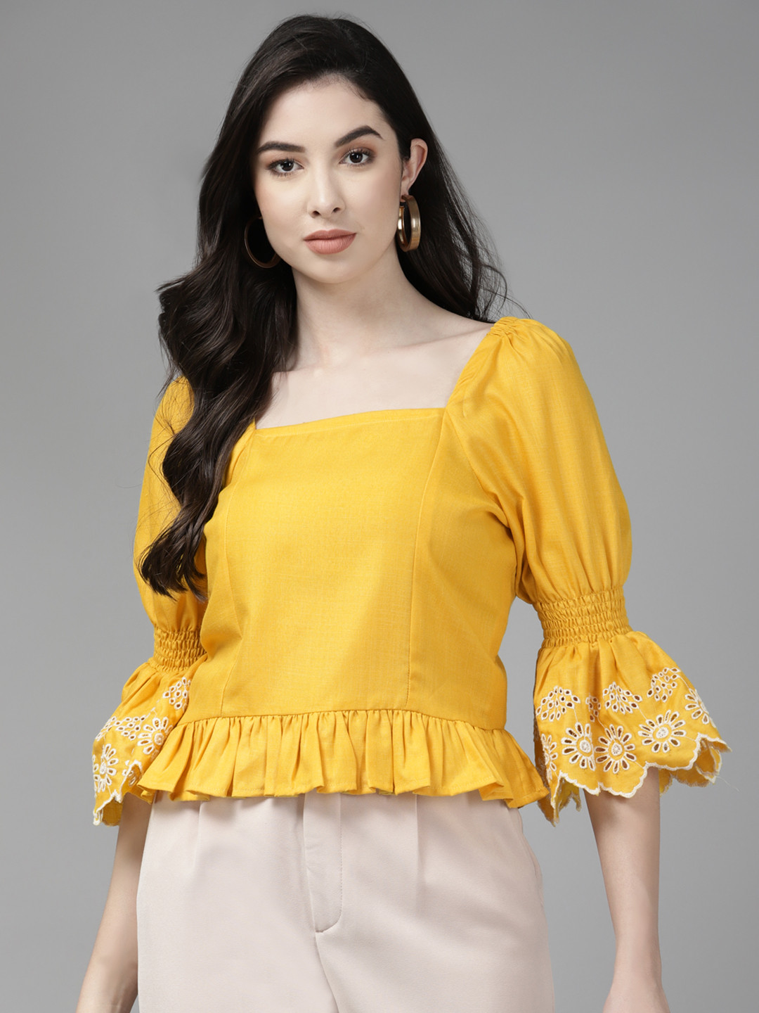 

Bhama Couture Yellow Schiffli Peplum Top