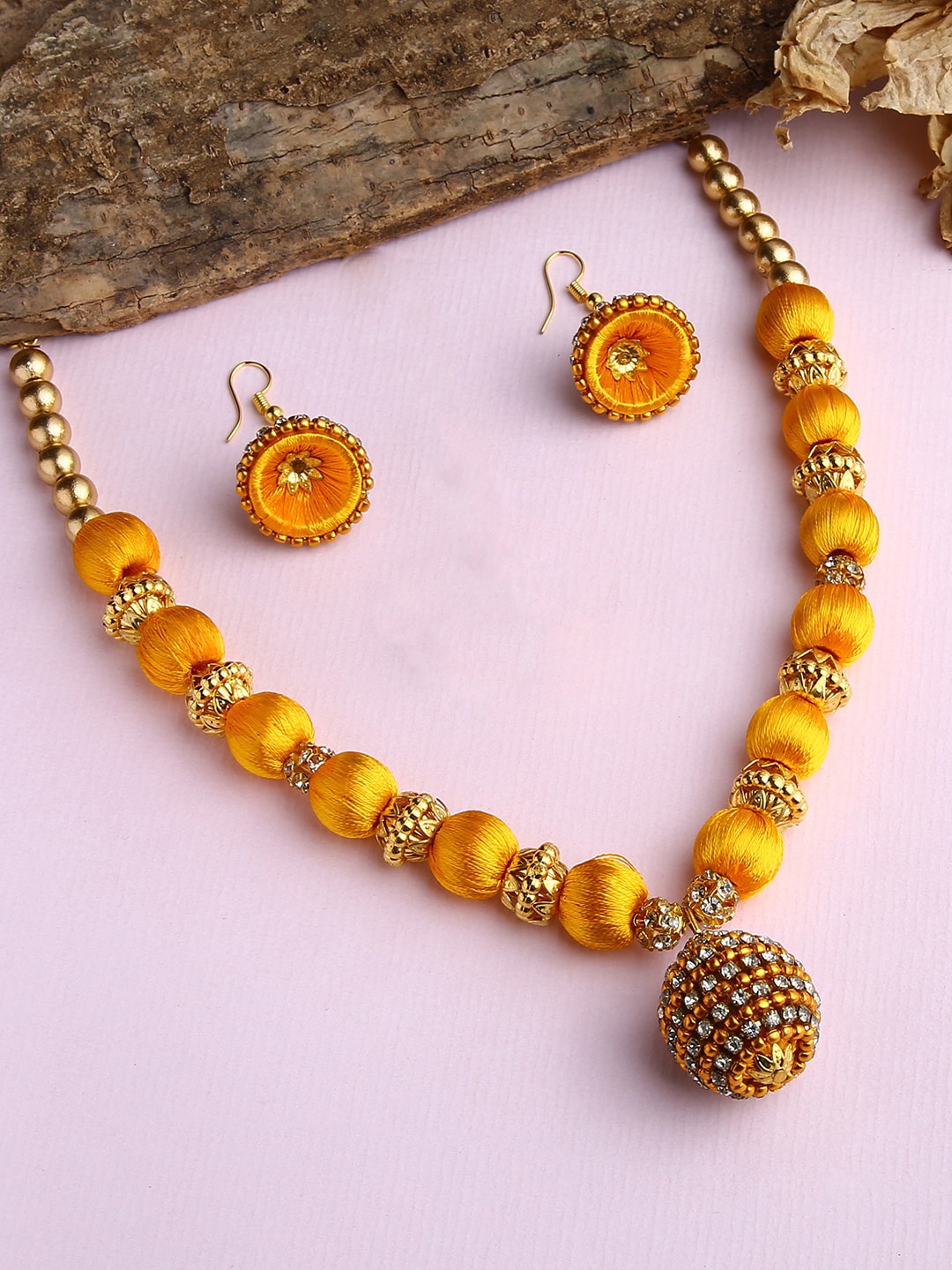 

AKSHARA Gold-Plated Yellow & White Stone Studded & Beaded Silk Thread Necklace Set