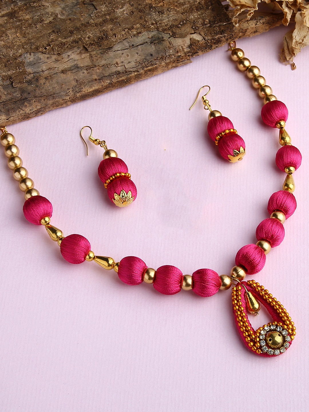 

AKSHARA Gold-Plated White Stone Studded & Beaded Silk Thread Necklace Set