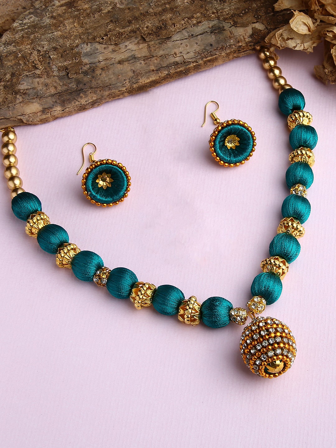 

AKSHARA Gold-Plated White Stone Studded & Beaded & Green Silk Thread Necklace Set