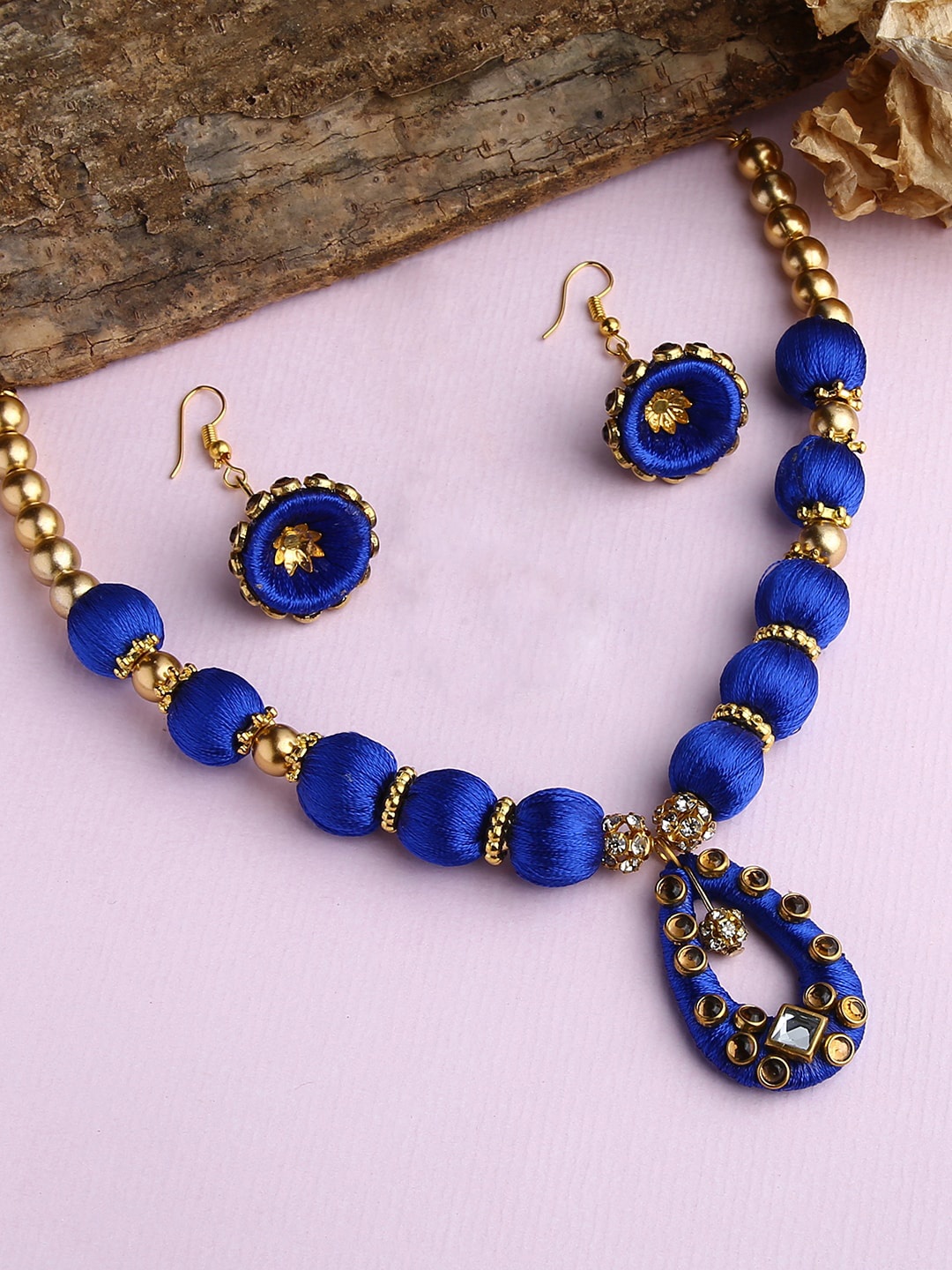 

AKSHARA Gold-Plated & Blue Stone Studded & Beaded & Blue Silk Thread Necklace Set