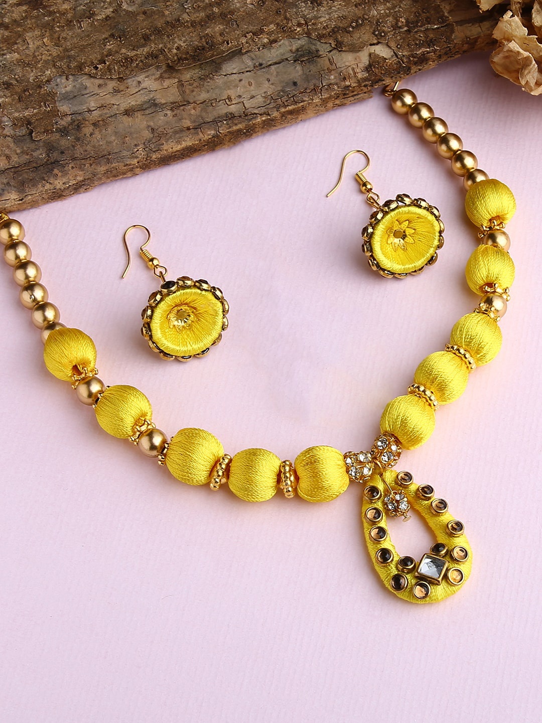 

AKSHARA Girls Gold-Plated & Yellow Stone-Studded & Beaded Silk Thread Jewellery Set