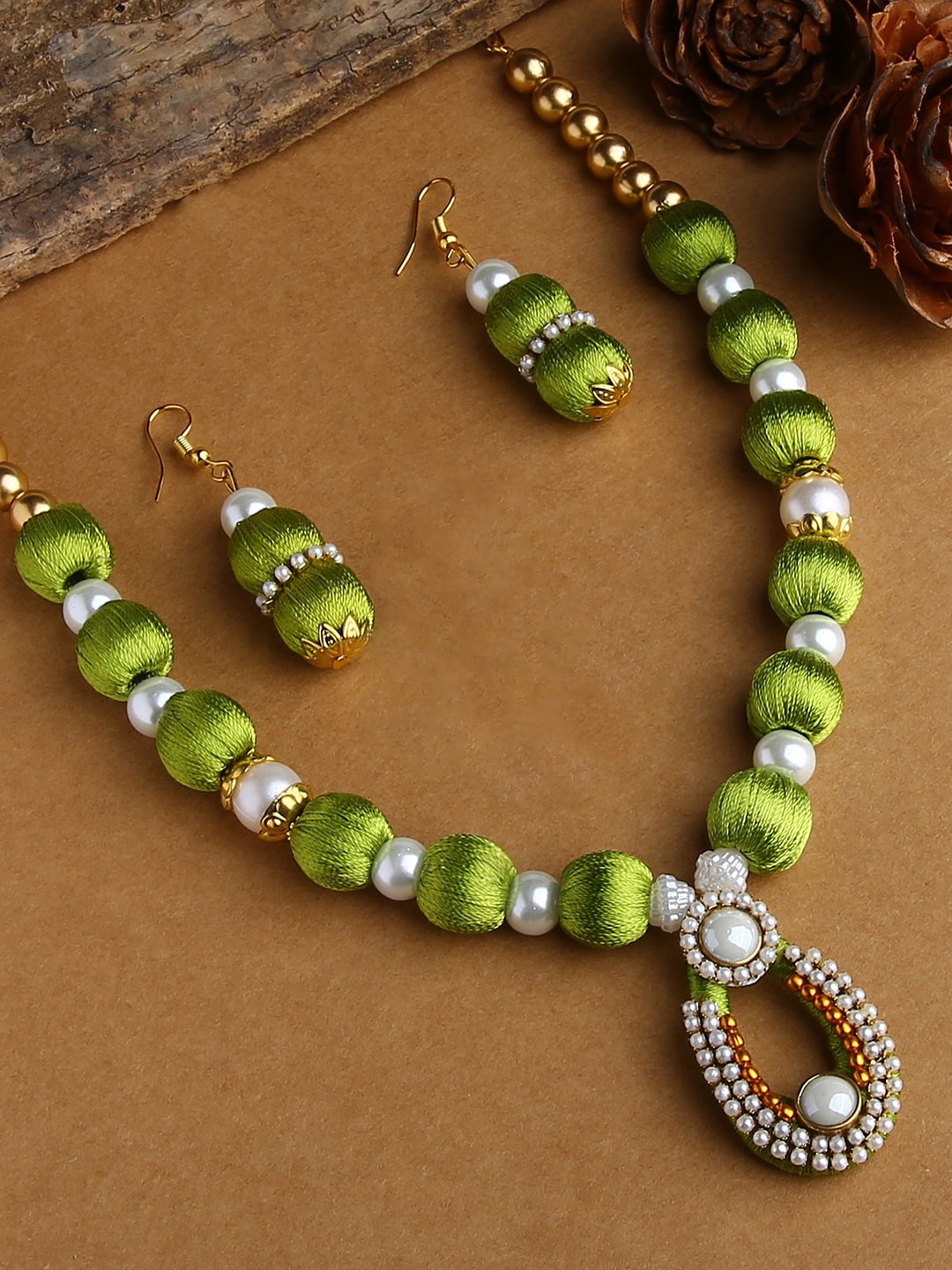 

AKSHARA Girls Gold-Plated Green & White Stone-Studded & Beaded Silk Thread Jewellery Set