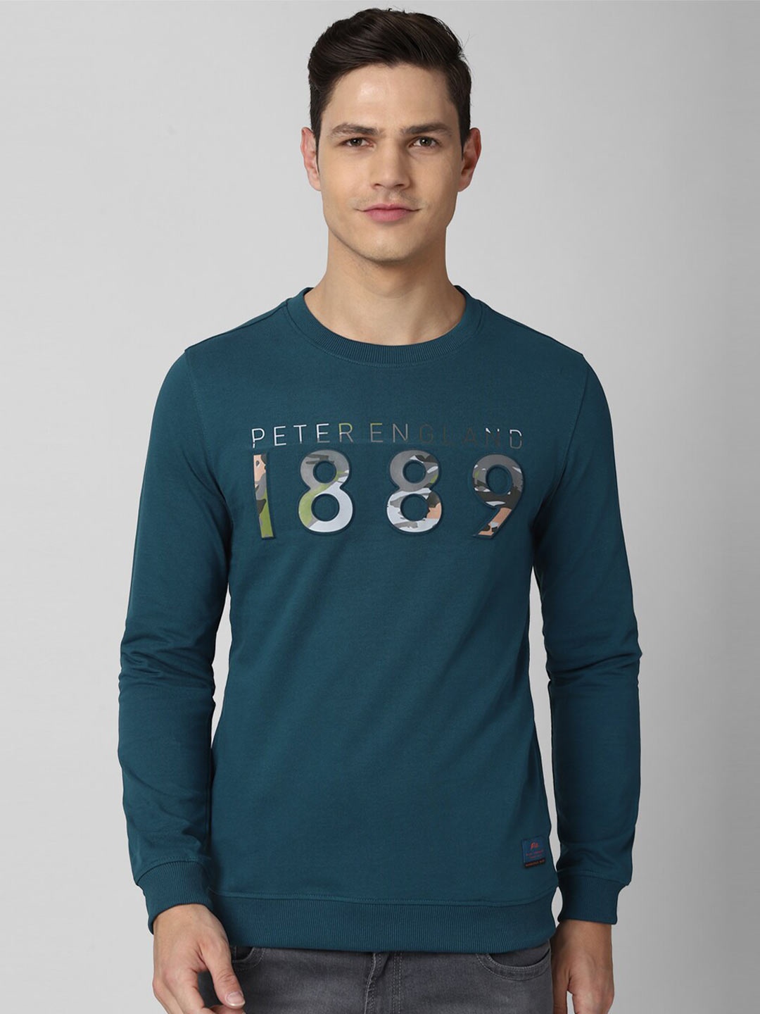 

Peter England Casuals Men Green Printed Sweatshirt