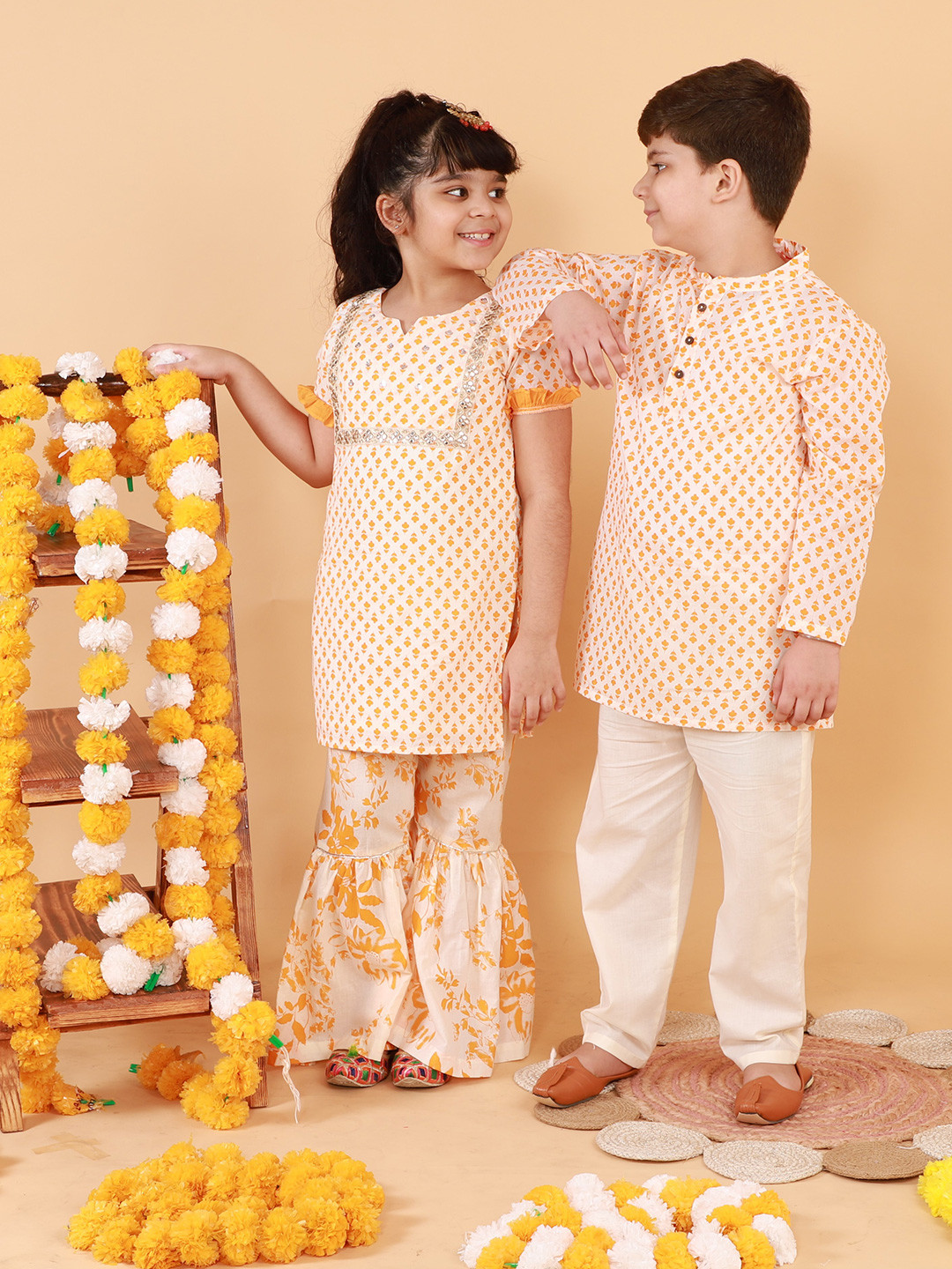 

LIL DRAMA Girls Yellow Floral Printed Mirror Work Pure Cotton Kurti with Palazzos