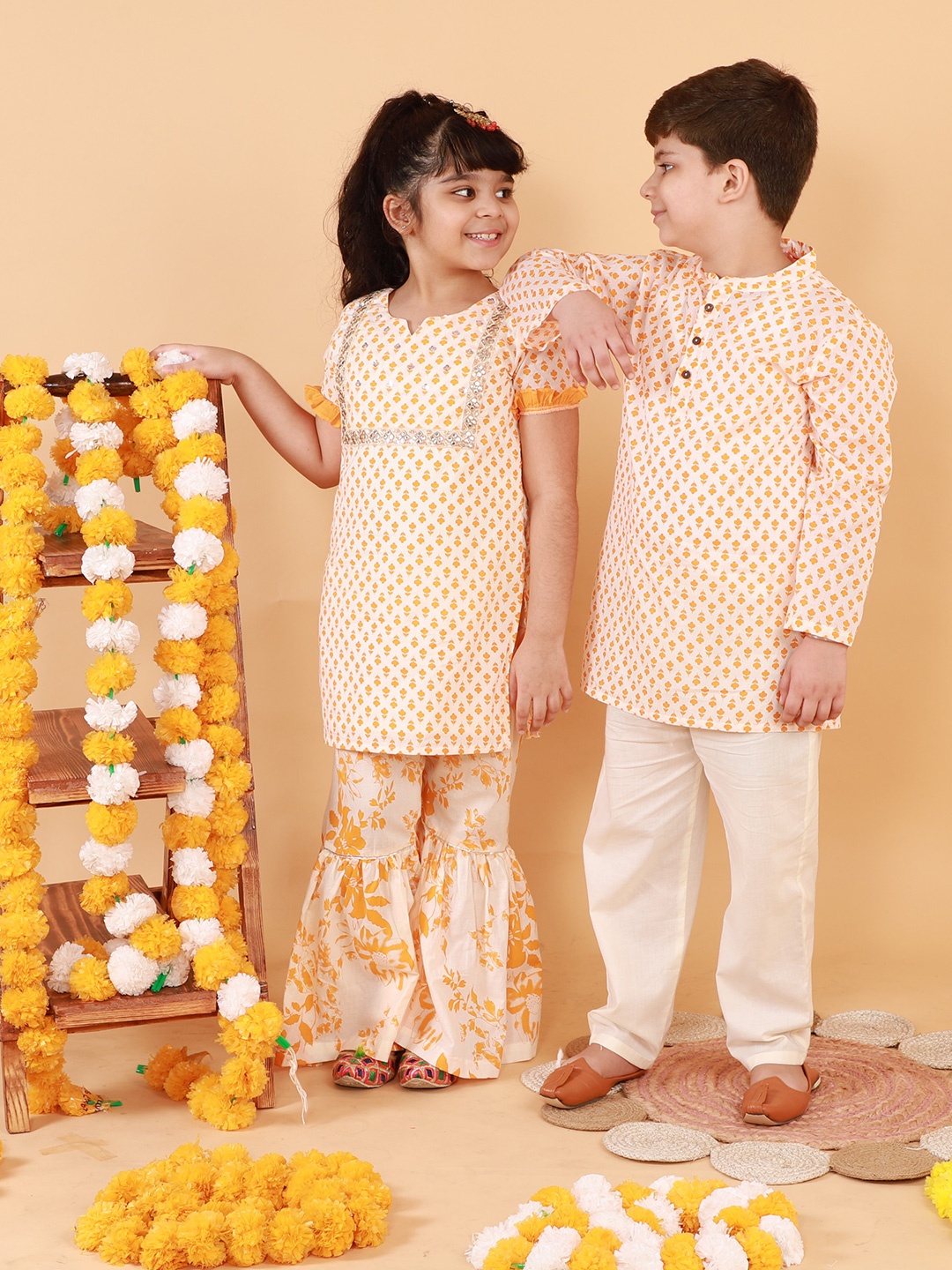 

LIL DRAMA Girls Yellow Floral Printed Mirror Work Pure Cotton Kurti with Palazzos