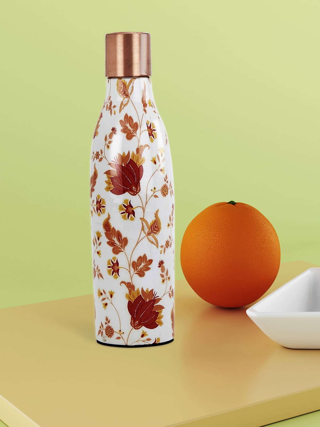 

Living scapes by Pantaloons Off-White & Orange Printed Copper Water Bottle
