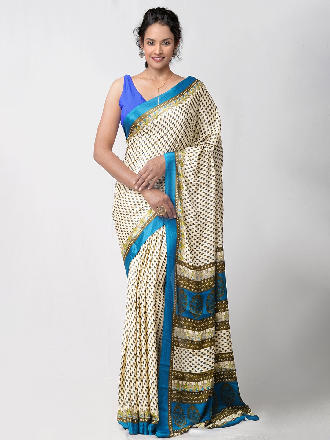 

Unnati Silks Cream-Coloured & Blue Ethnic Motifs Patola Saree