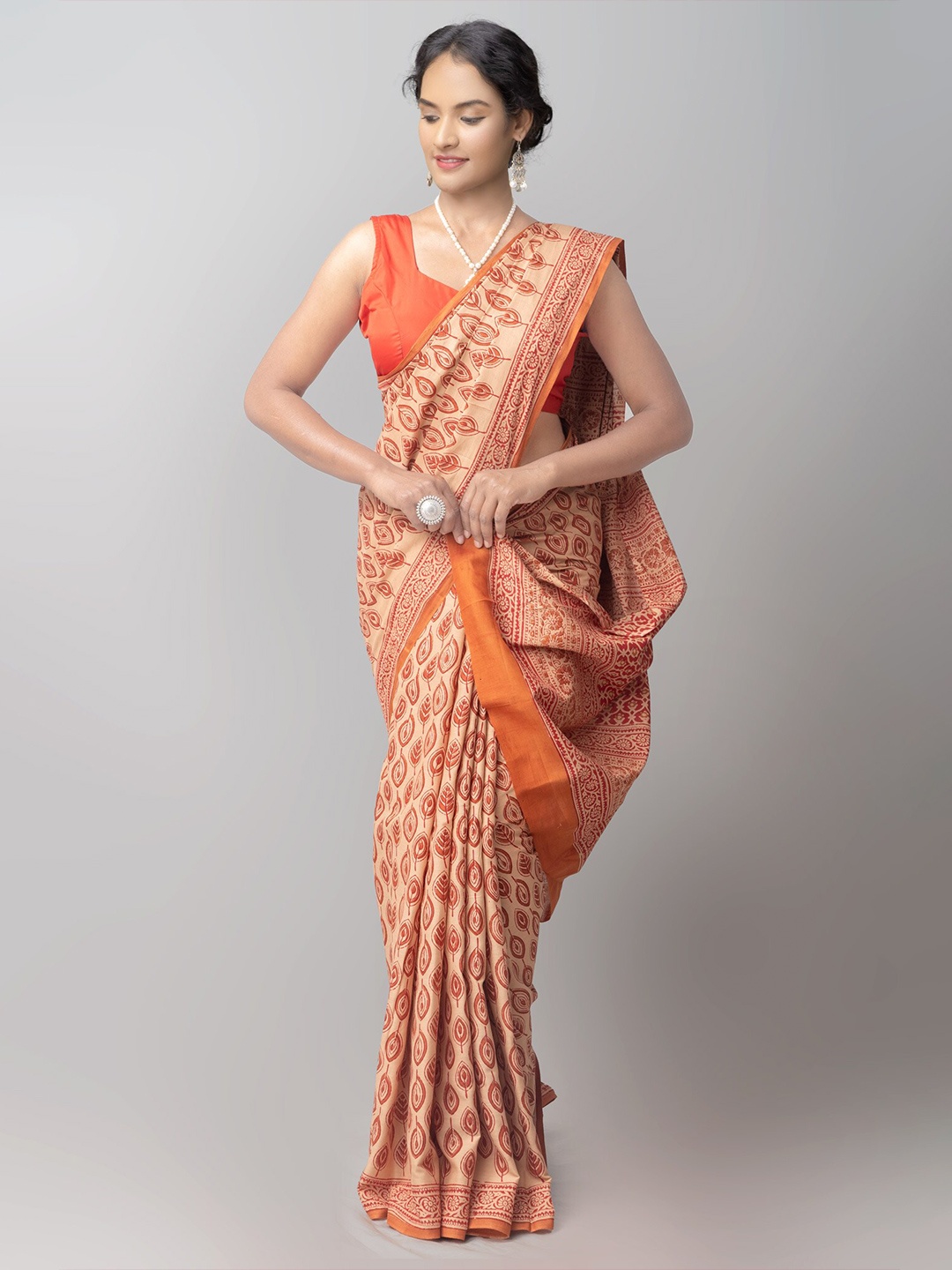

Unnati Silks Cream & Orange Ethnic Motifs Printed Pure Cotton Handloom Saree