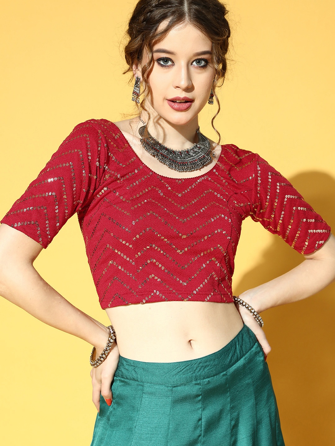 

Inddus Women Red Sequinned Stretchable Blouse