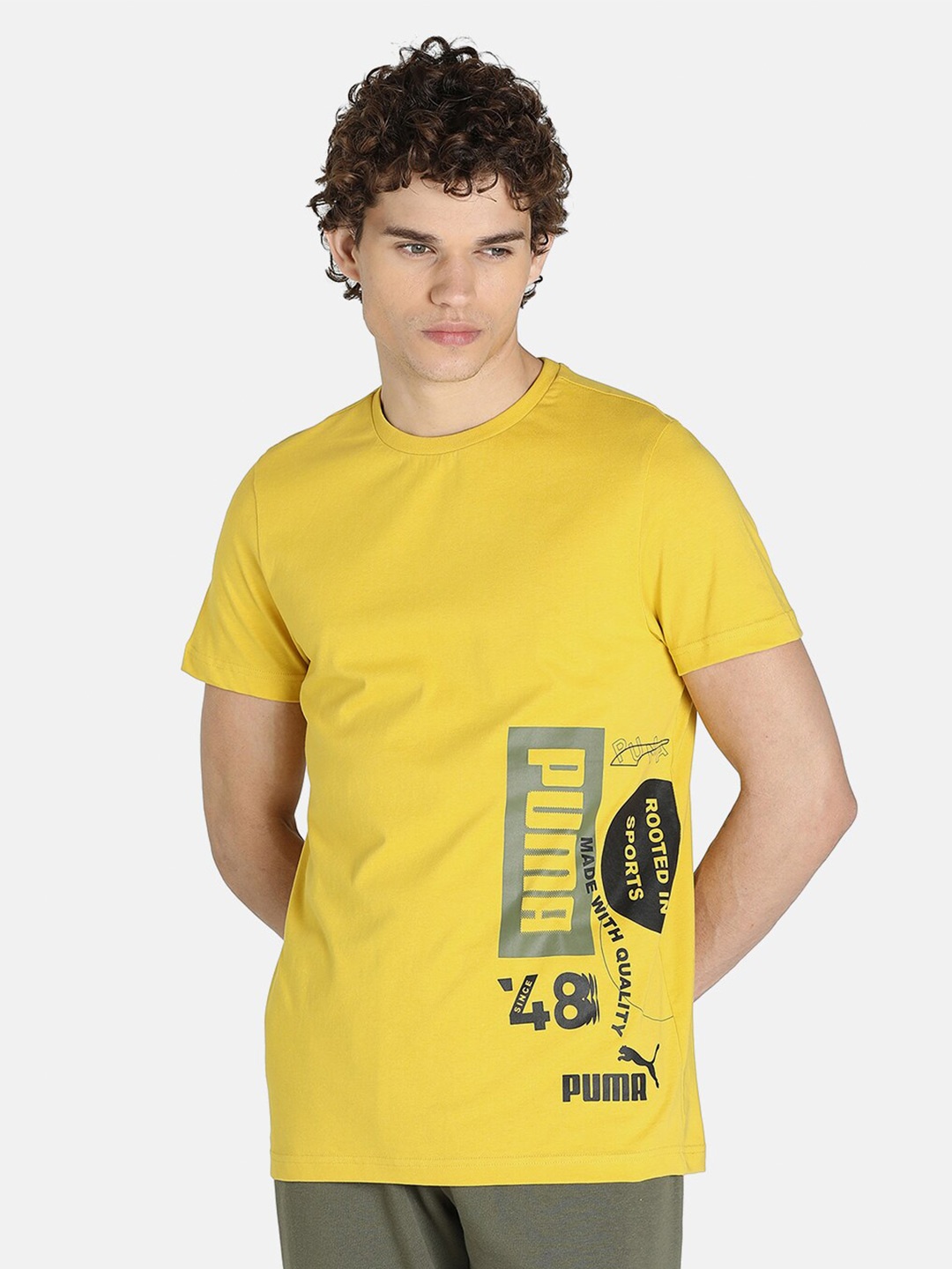 

Puma Men Yellow & Black Typography Printed Cotton Training or Gym T-shirt