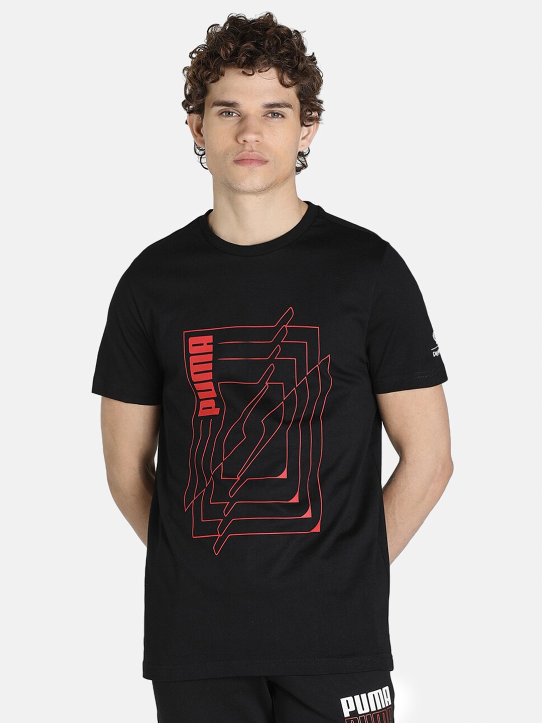 

Puma x Dream11 Men Black Graphic Tee 10 Regular Fit Pure Cotton Tshirts