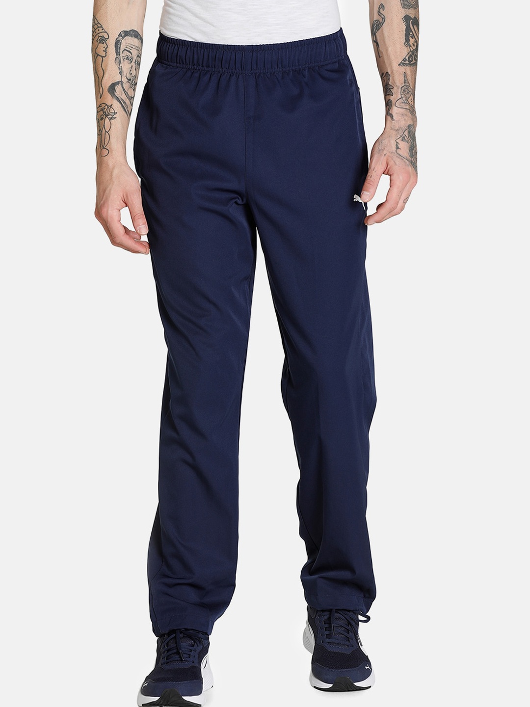 

Puma Men Regular Fit Solid Essential Woven Track Pants, Blue