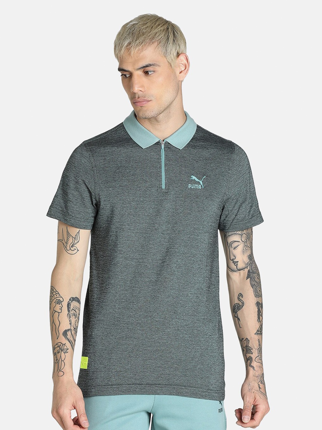

Puma one8 Virat Kohli Men Blue Jaquard Cotton Polo Slim Fit Tshirts