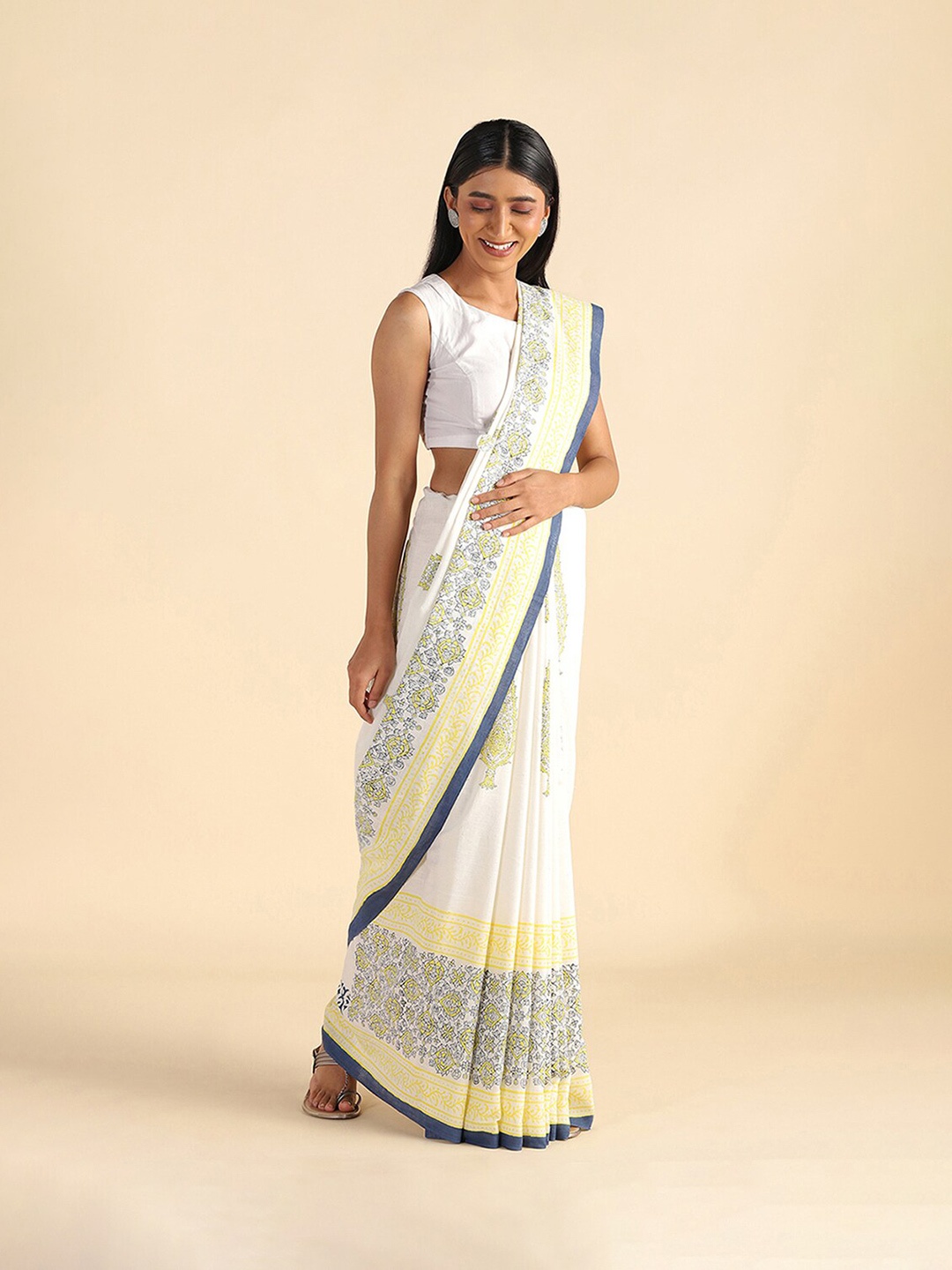 

Taneira Yellow & White Ethnic Motifs Pure Cotton Khadi Saree