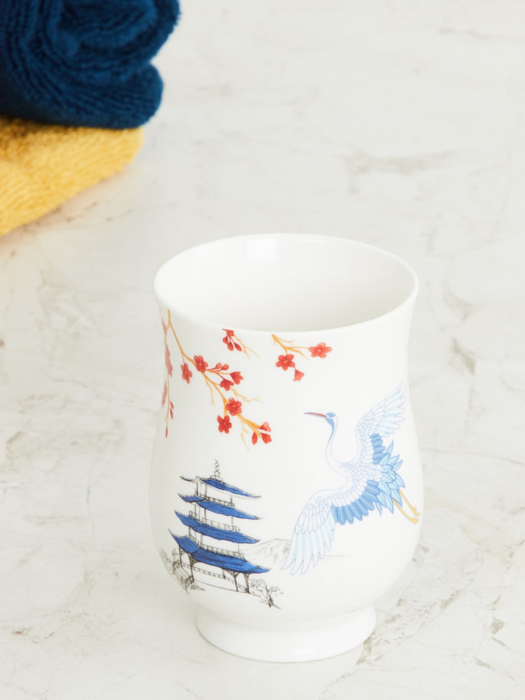 

Home Centre White & Blue Art of Asia-Pagoda Pride Printed Ceramic Tumbler