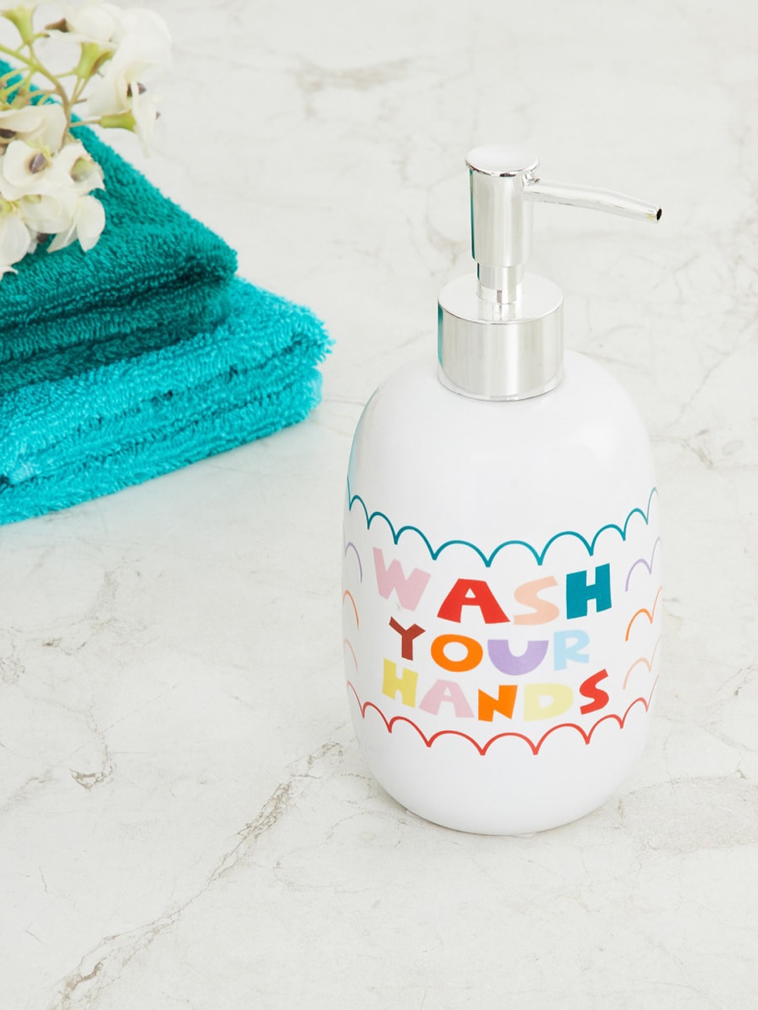 

Home Centre White Printed Round Ceramic Soap Dispenser