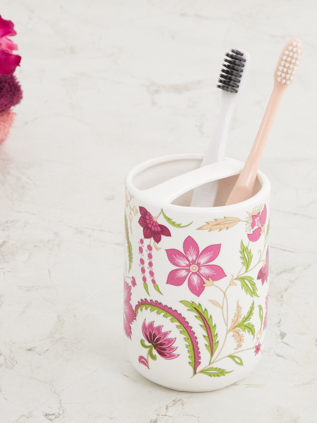 

Home Centre Pink & White Printed Ceramic Tooth Brush Holder