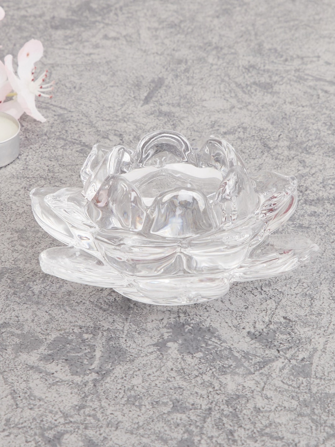 

Home Centre Transparent Textured Glass Floral Candle Holder