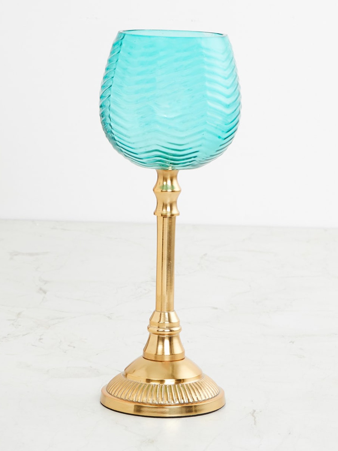 

Home Centre Teal Blue & Gold Toned Textured Glass Zigzag Votive Candle Holder
