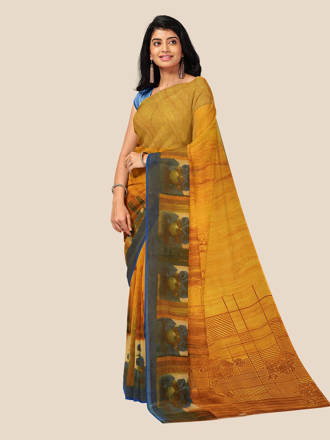 

Kalamandir Mustard Floral Pure Georgette Saree