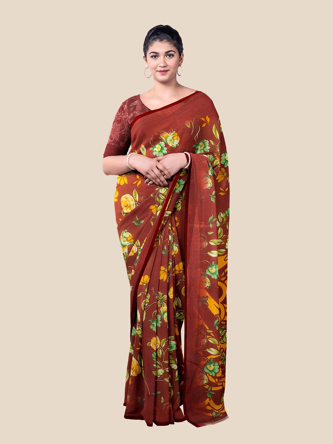 

Kalamandir Maroon & Green Floral Zari Pure Georgette Saree