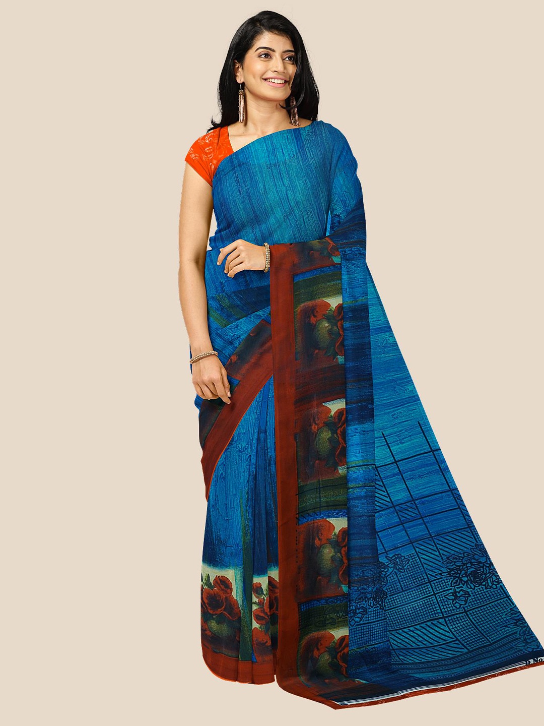 

Kalamandir Blue & Rust Red Floral Pure Georgette Saree