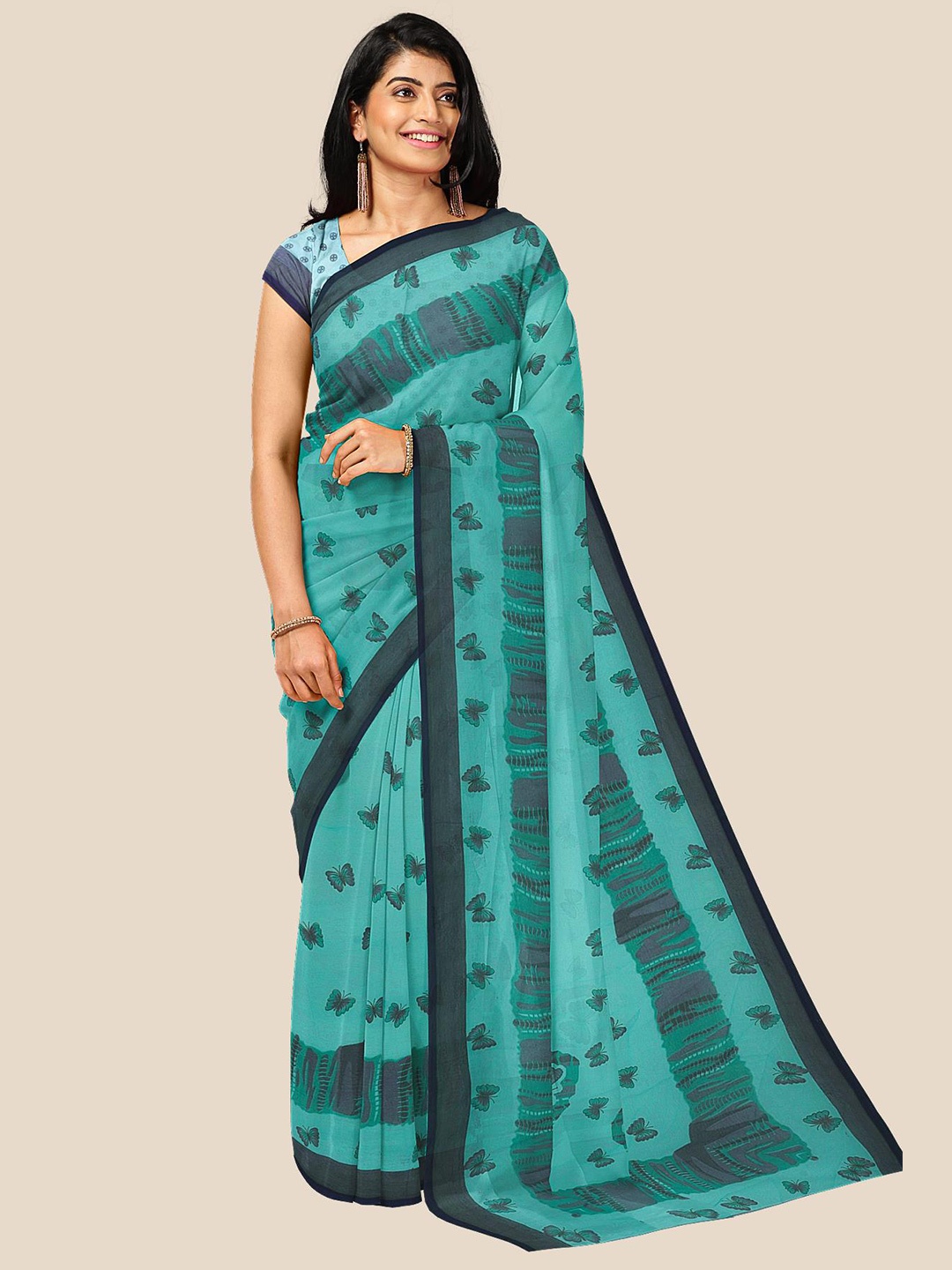 

Kalamandir Blue & Green Floral Printed Pure Georgette Saree