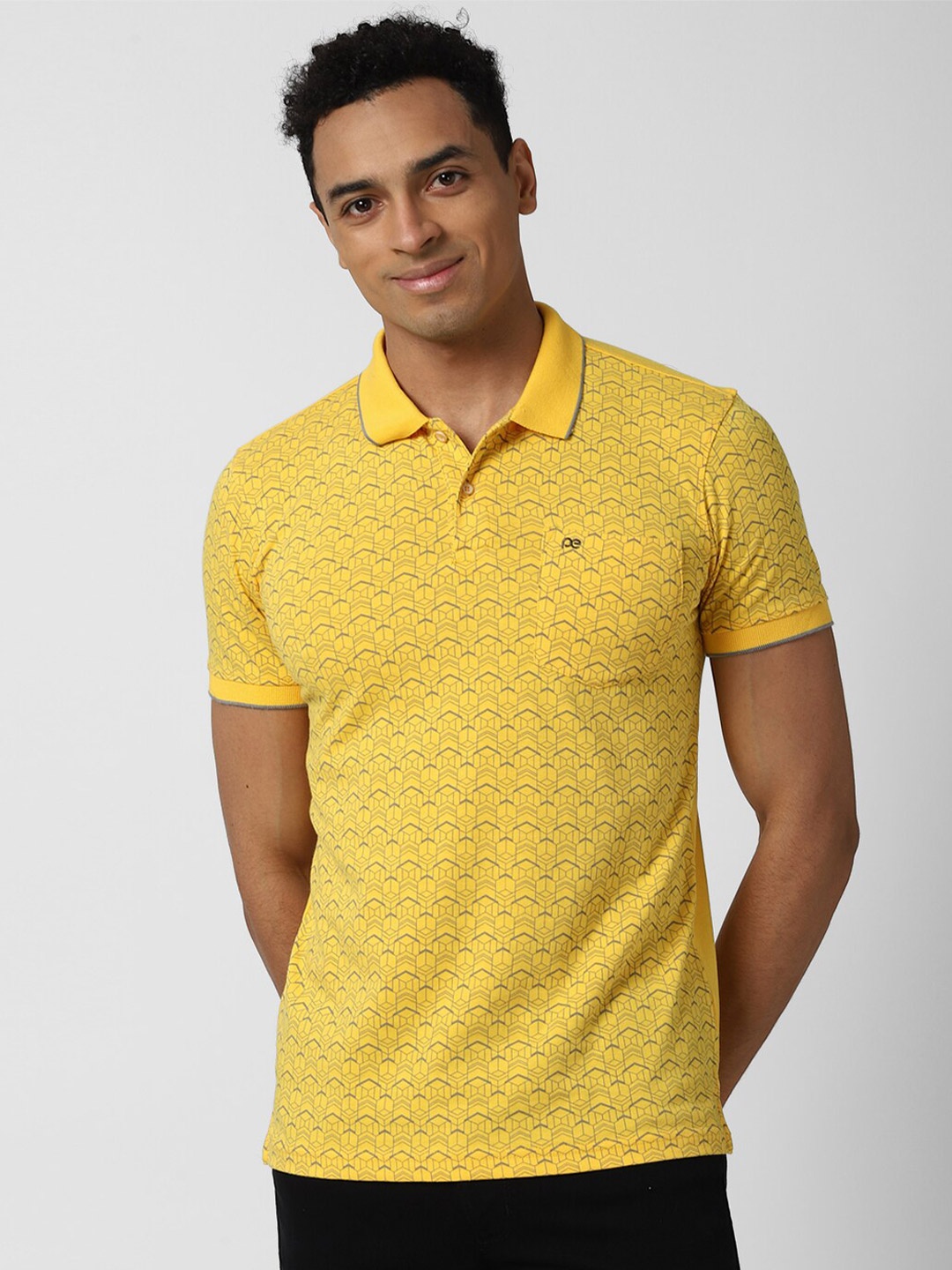 

Peter England Casuals Men Yellow Printed Polo Collar Slim Fit Cotton T-shirt