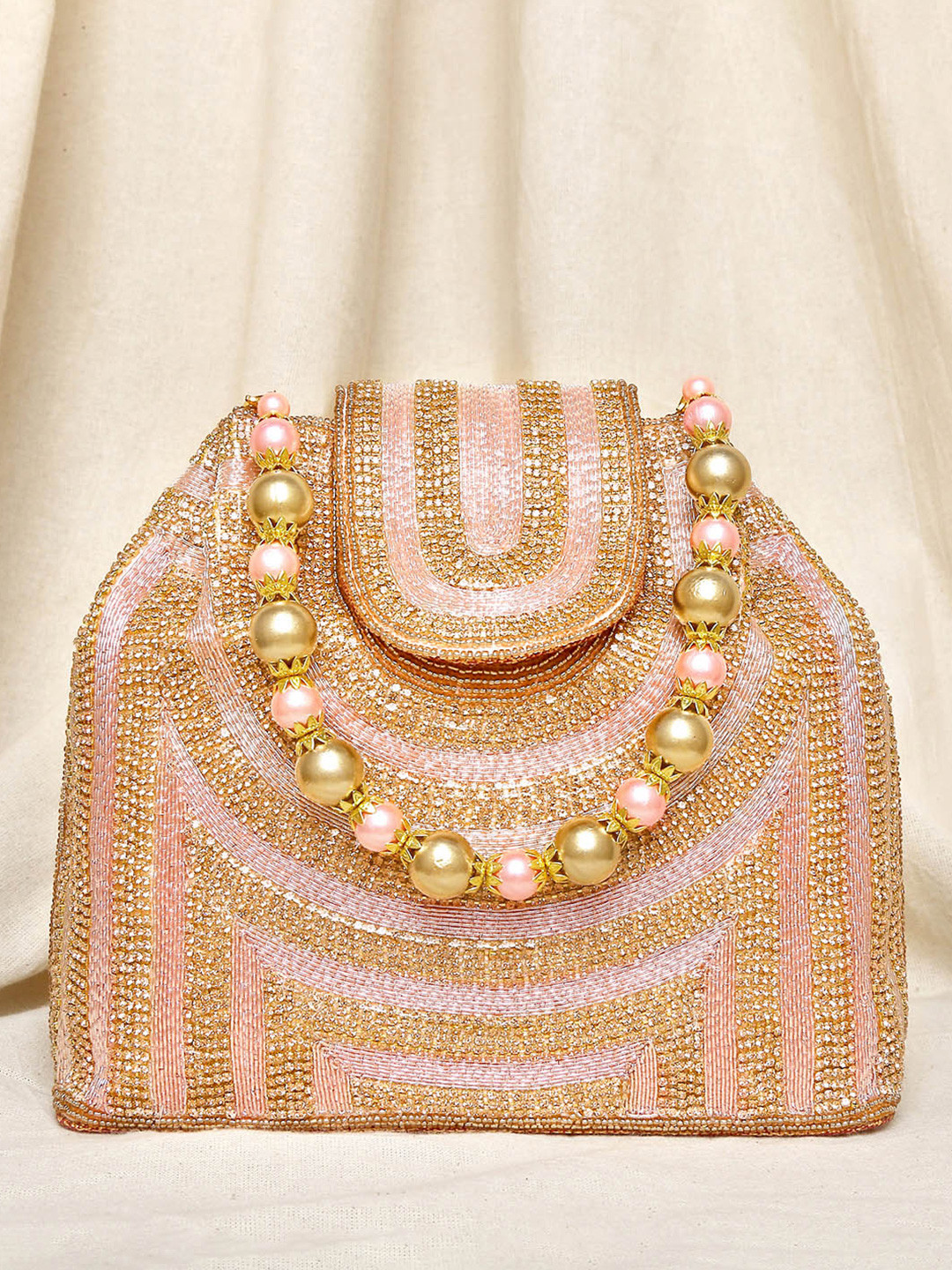 

Peora Rose Gold Embellished Potli Clutch