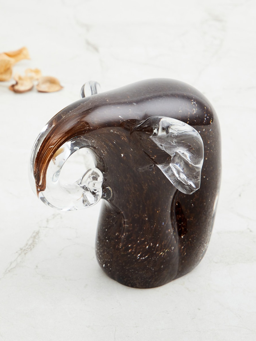 

Home Centre Brown Solid Glass Elephant Figurine Showpiece