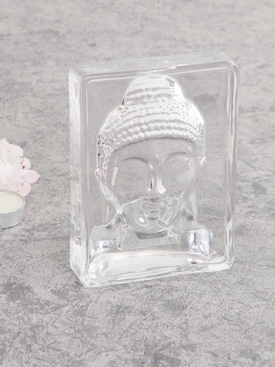 

Home Centre Transparent Solid Glass Buddha Figurine Showpiece