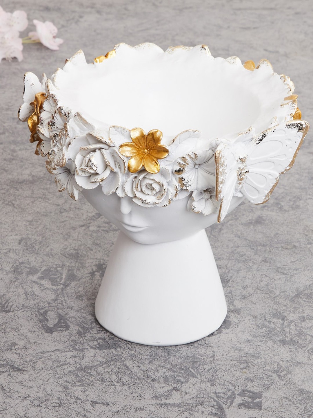 

Home Centre White & Gold-Toned Ceramic Floral Head Figurine Showpiece