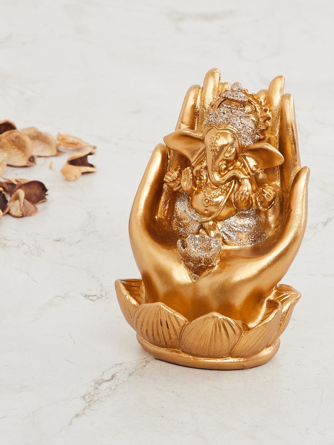 

Home Centre Gold-Toned Textured Ganesha In Hand Showpiece