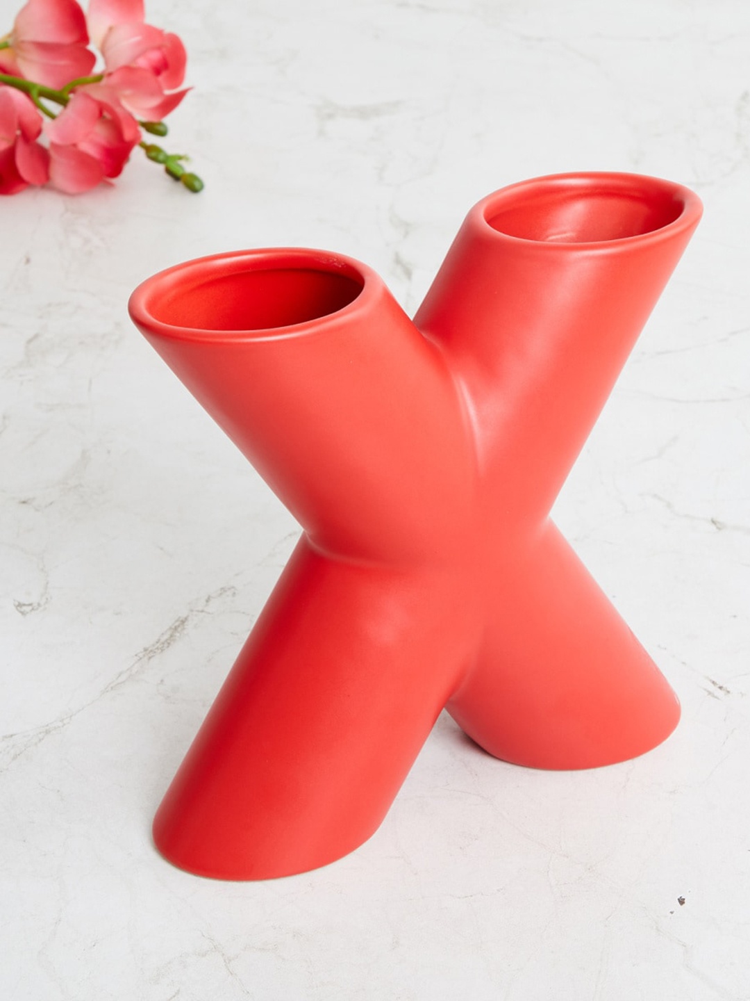 

Home Centre Red Cross Shaped Ceramic Table Accent