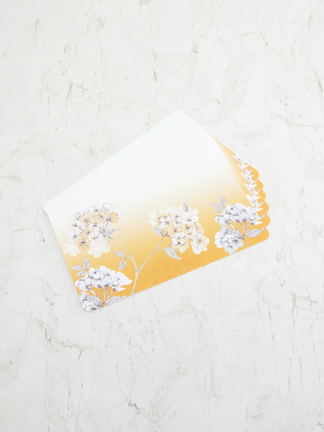 

Home Centre Set Of 6 Yellow Mandarin Printed Polypropylene Placemats