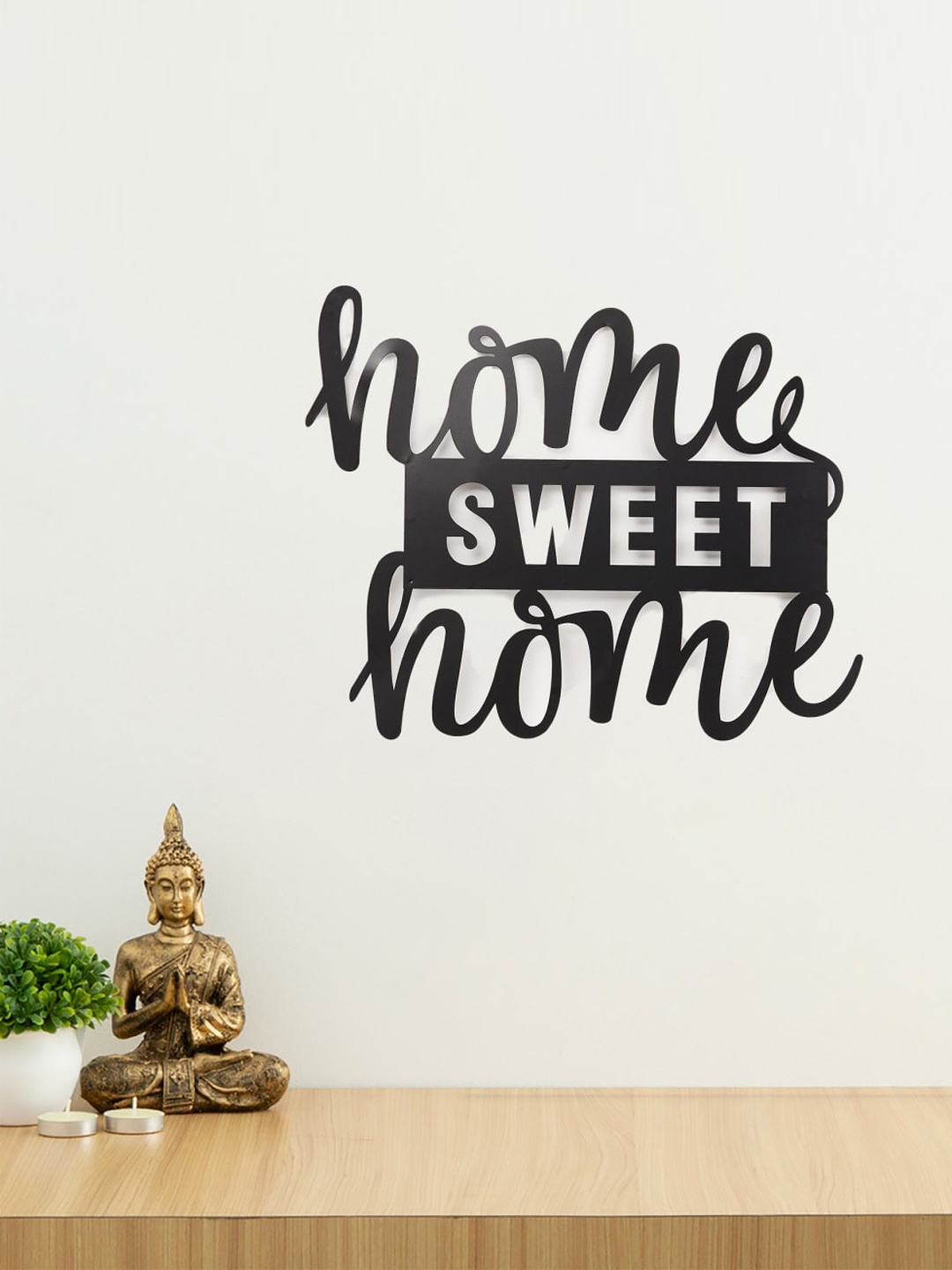 

Home Centre Black Sweet Home Metal Wall Art