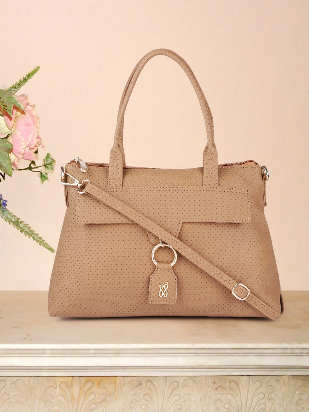 

Baggit Women Beige Textured Handheld Bag