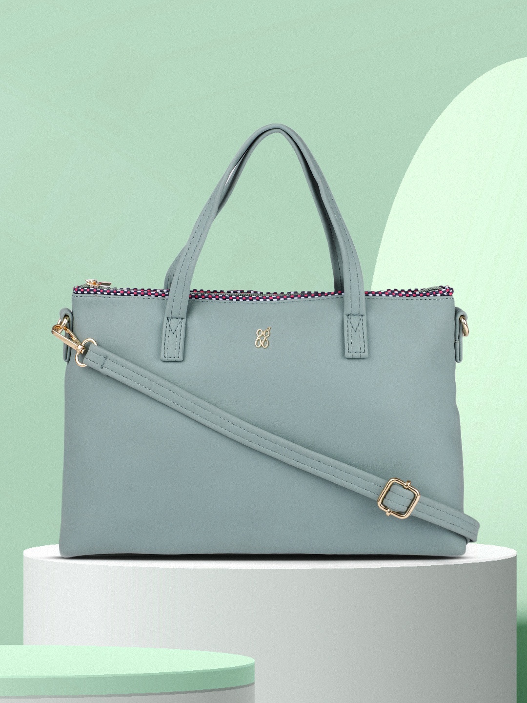 

Baggit Sea Green Solid Handheld Bag