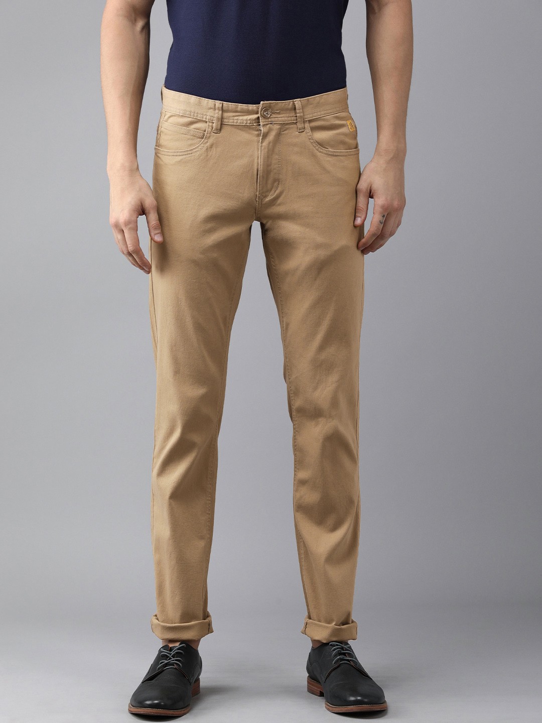 

Van Heusen Sport Men Beige Solid Slim Fit Regular Trousers