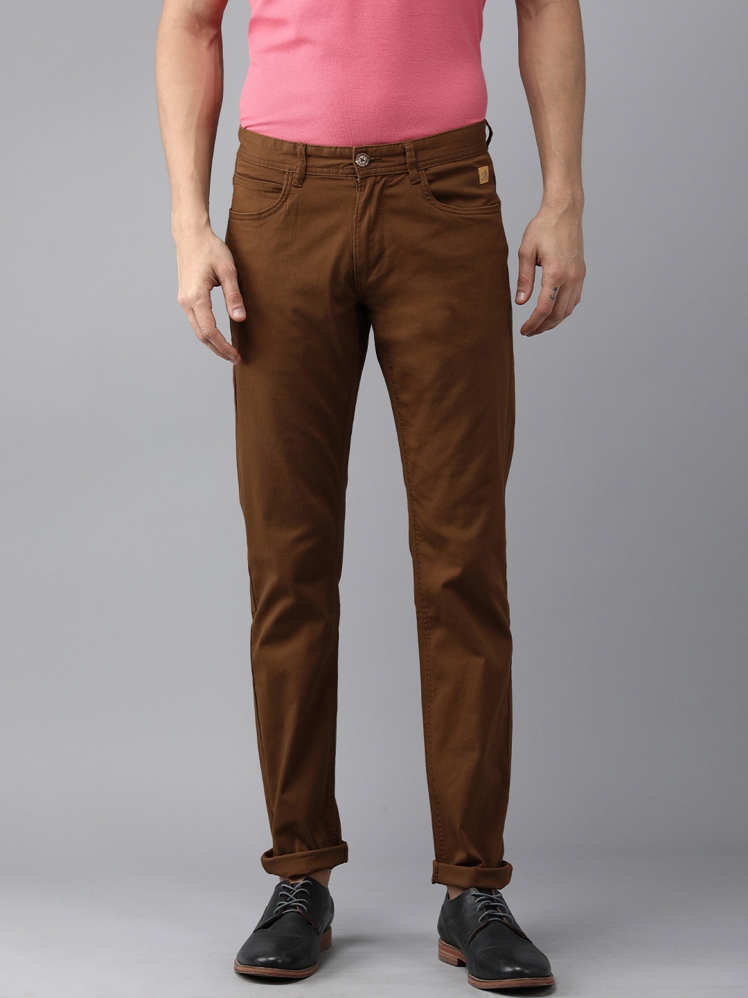 

Van Heusen Sport Men Tan Solid Tapered Fit Regular Trousers