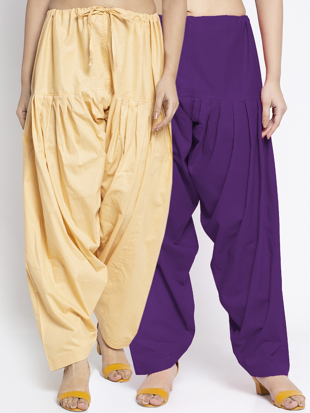 

Jinfo Women Pack Of 2 Beige & Purple Solid Loose Fit Cotton Salwars