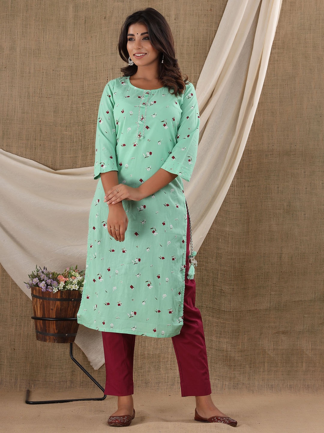 

KAAJH Women Sea Green Floral Printed Cotton Kurta With Trouser & Dupatta